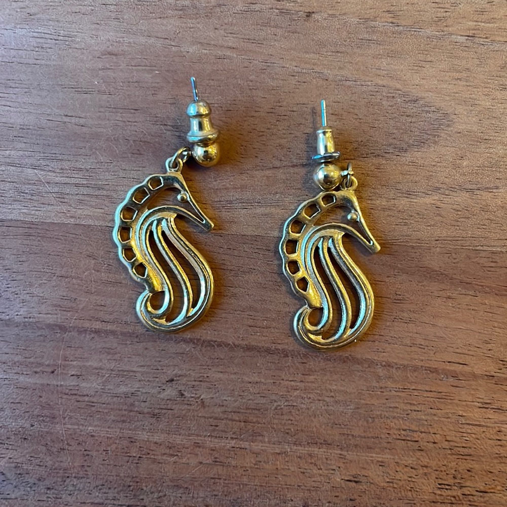 Seahorse earrings.